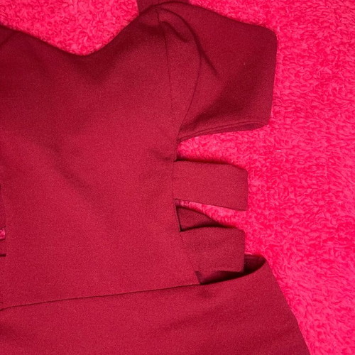 Red mini dress like new, fitted with cutouts and bust support