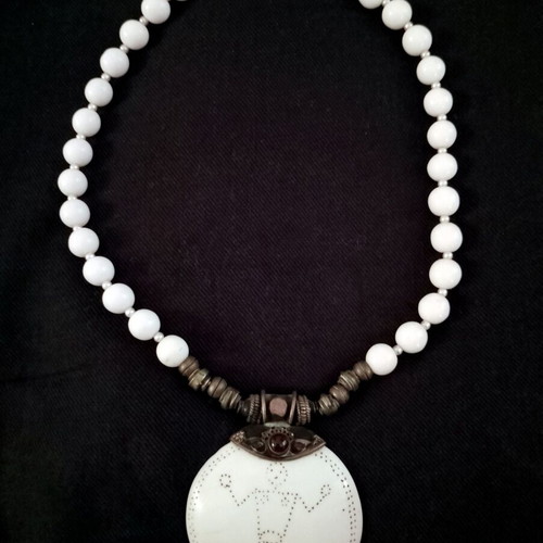 Handmade necklace with white pearls and bone charm used