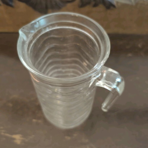 Tall glass jug with handle like new