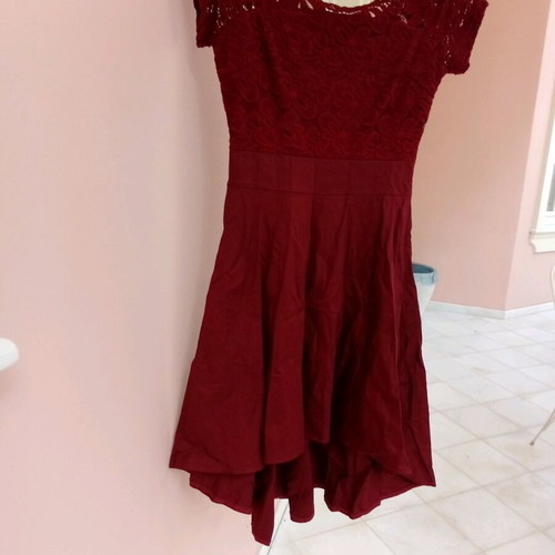 Women's asymmetrical dress new, size small, lace detail