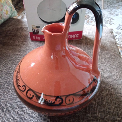 Ceramic wine jug like new with painted border