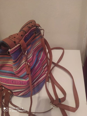 Backpack with fringes like new, brown
