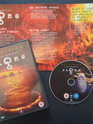 Signs DVD like new with English audio and subtitles