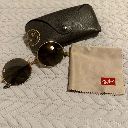Ray-Ban Oval sunglasses used with gold frame and gray lenses
