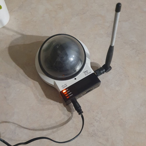 Security camera used with power supply, remote motion, audio support