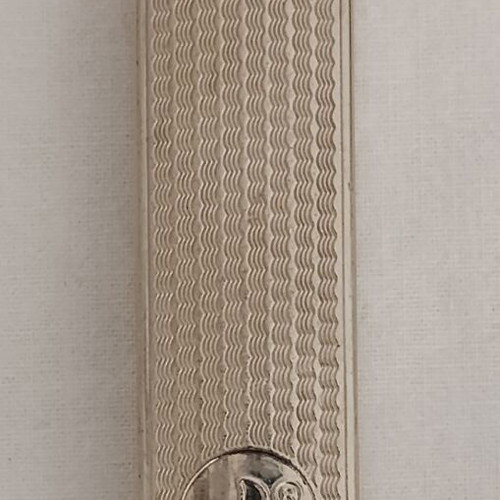 Old cigarette case with built-in lighter used, 1980s metal corporate gift