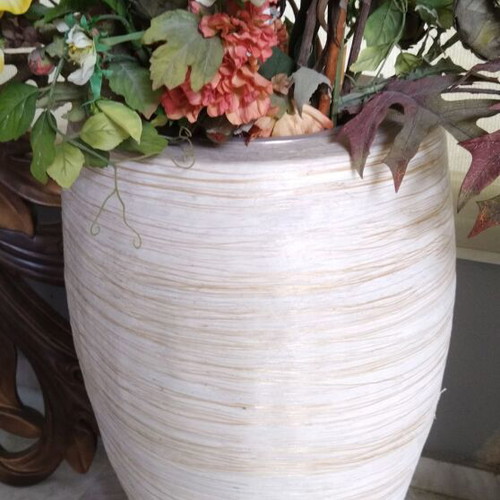 Ivory floor vase used with beige and gold thread weave