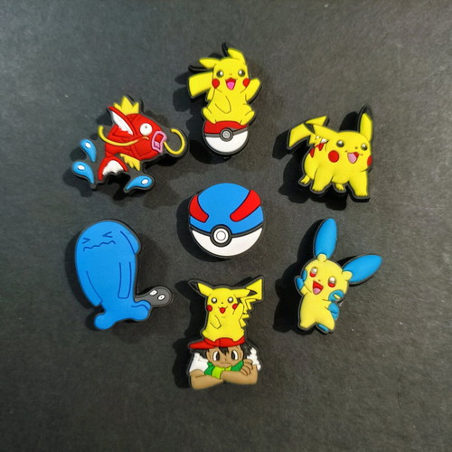 Pokémon Crocs Charms set like new, blue and multicolor