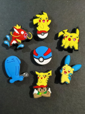 Pokémon Crocs Charms set like new, blue and multicolor