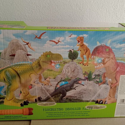 Dinosaur toy like new, in original box with minor wear