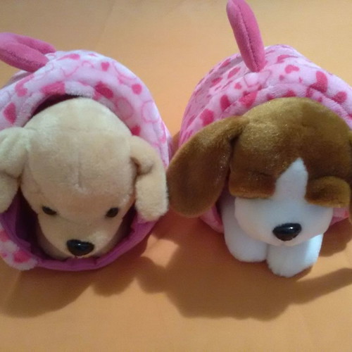 Stuffed dogs used with suitcases