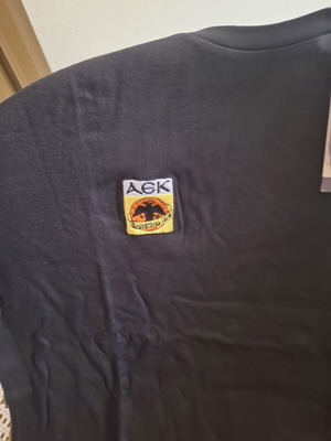 Μπλούζα ΑΕΚ Basketball XL καινούργια, vintage 2000, βαμβακερή Champion
