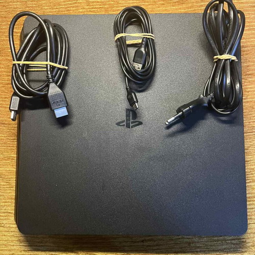 Sony PlayStation 4 Slim 1TB like new with SSD and DualShock 4