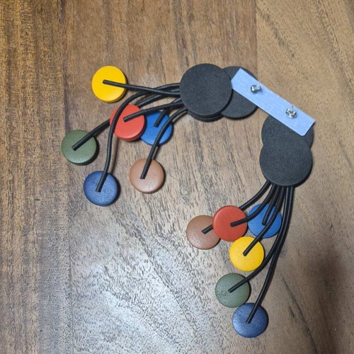 Colorful earrings with silicone cord and rubber parts, new
