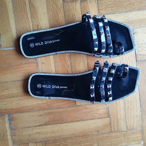 Unique flat slippers like new, black size 40