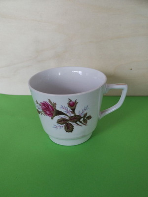 Vintage porcelain cup with roses and angled handle like new