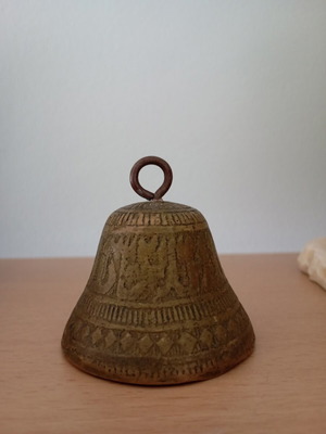 Vintage brass bell with embossed geometric designs like new