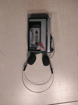 Stereo cassette tape player SANYO used, classic Walkman with headphones