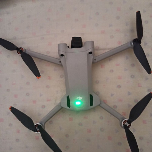 DJI Mini 3 Pro drone with two controllers and accessories