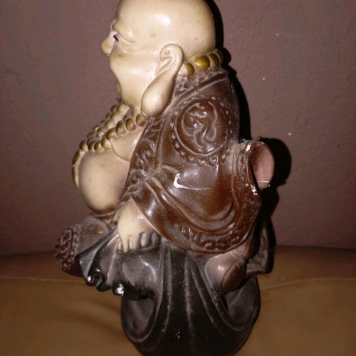 Budai statue used, symbol of happiness and prosperity