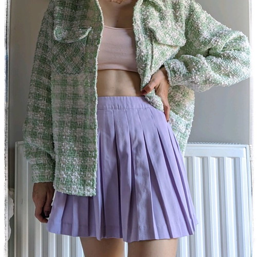 Mini skirt with pleats like new, pastel purple, size 34