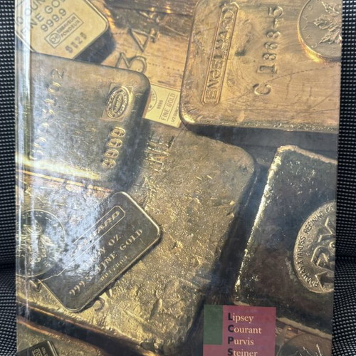 Economics Book 10th Edition by Lipsey, Courant, Purvis & Steiner like new