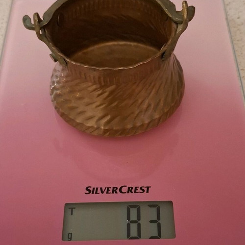Copper miniature bucket used with hammered finish and metal handle
