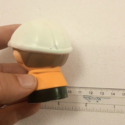 Cat plastic figurine used with ink marks