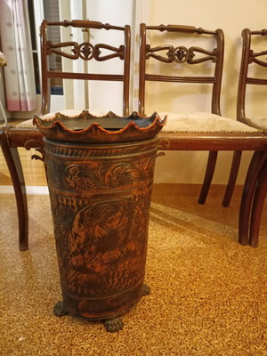 Umbrella stand with embossed designs