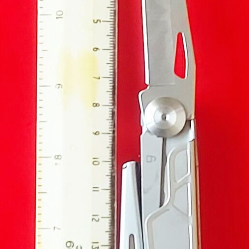 Multitool new with large scissors, knife, and double-tip screwdriver