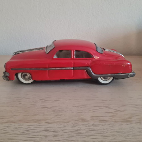 1950's Pontiac 1:18 tin car with friction mechanism, like new