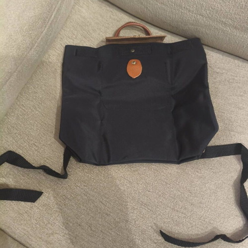 Foldable backpack like new, black with brown details