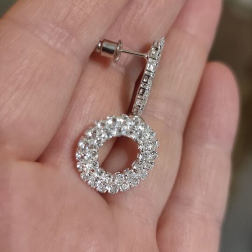 Silver earrings new with small zircons
