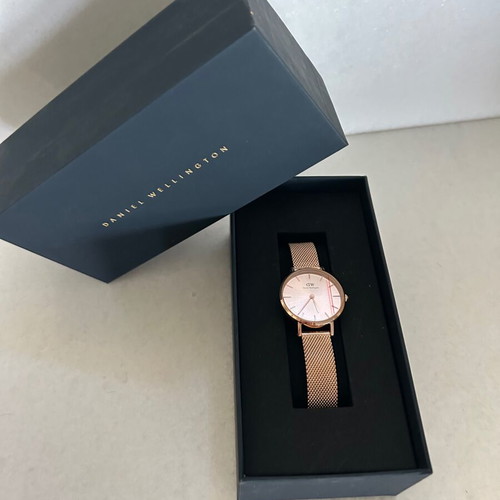 Daniel Wellington Petite Unitone watch with rose gold metal bracelet