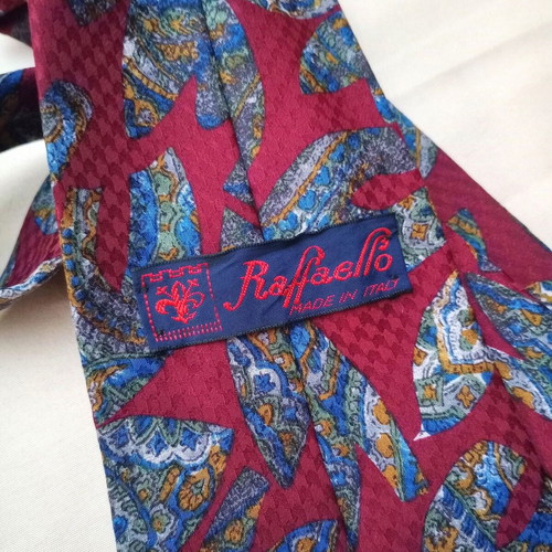 Silk tie 10cm like new, red with multicolor pattern