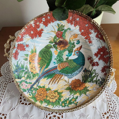 Vintage porcelain decorative plate with gilded details