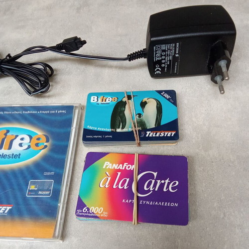 Ericsson GA 628 mobile phone used, vintage collectible with charger and cards