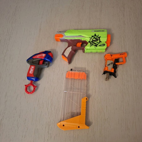 Nerf Zombie Strike Sidestrike Blaster used with two small Nerf and magazine