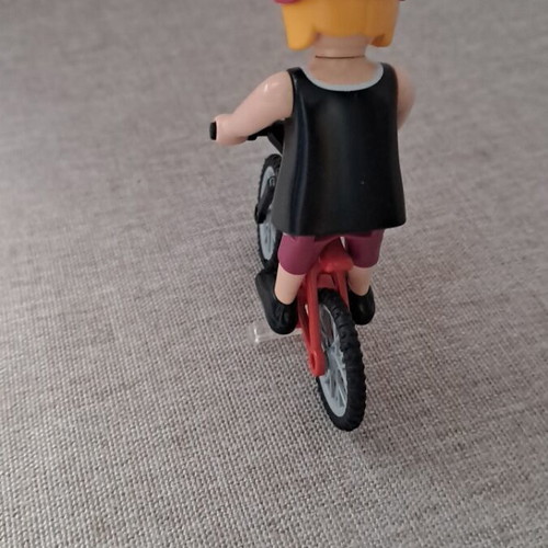 Playmobil woman with bicycle figure