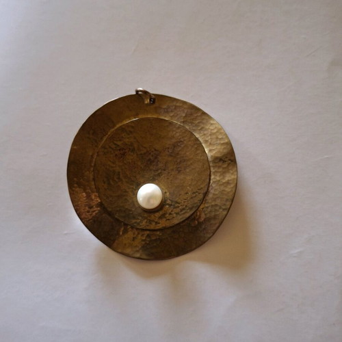 Pendant for necklace used with brown marks