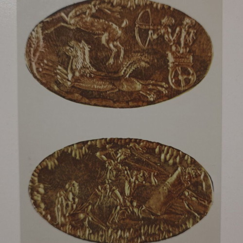 Postcard used with golden rings and hunting and battle scenes