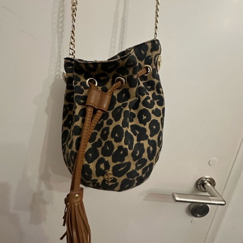 Juicy Couture crossbody bag used with leopard pouch