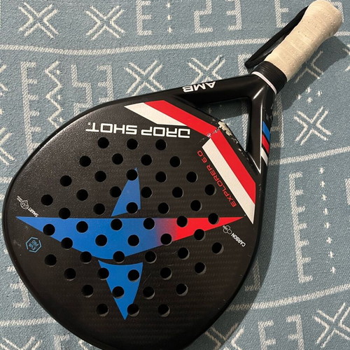 Padel racket Drop Shot used with signs of wear