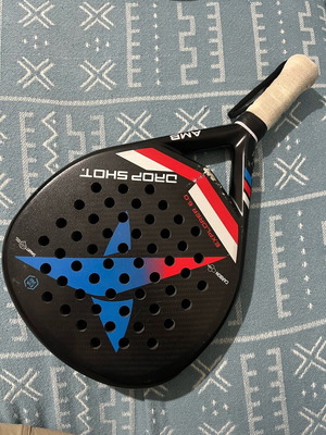 Padel racket Drop Shot used with signs of wear