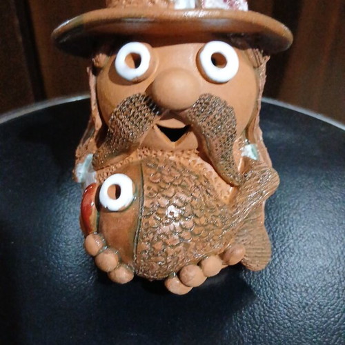 Vintage Handmade Ceramic Bell Fisherman Figurine, like new