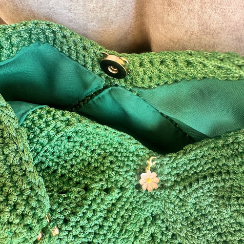 Handmade green shoulder bag with gold chain and decorative tassels