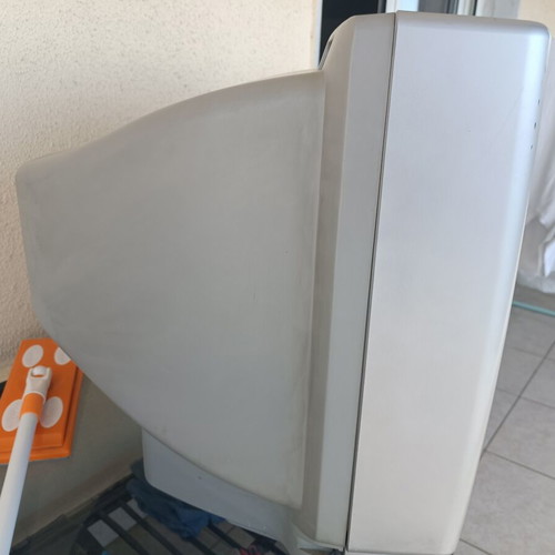 Schaub Lorenz 21-inch TV like new, silver color with remote