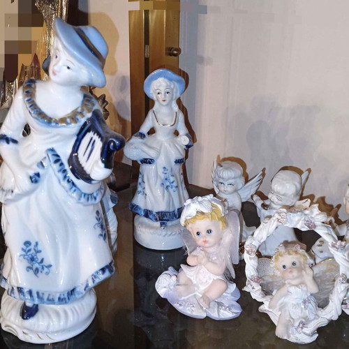 Porcelain decorative figures new, set of 15 pieces
