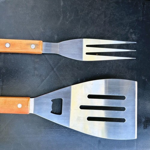 Barbecue set used with stainless steel fork and spatula with wooden handles