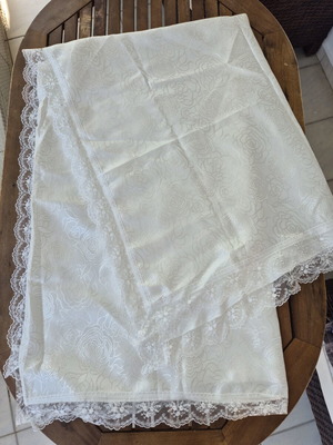 White floral tablecloth with delicate lace edges like new